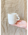 Handmade stoneware mug with seashell