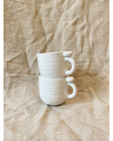 Handmade stoneware expresso mug with seashell