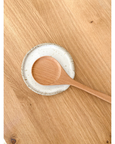 white speckled ceramic spoon rest