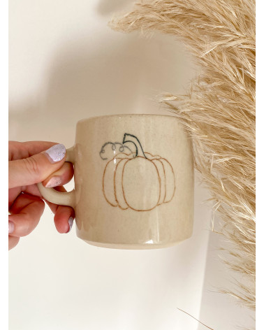 Handmade artisanal ceramic pumpkin cup