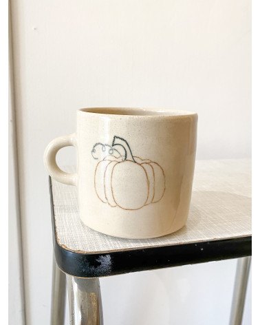 Handmade artisanal ceramic pumpkin cup