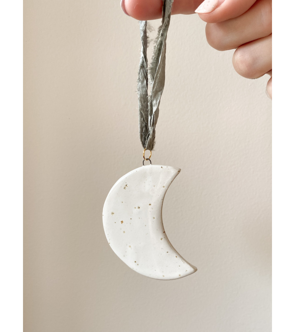 Ceramic moon with silk ribbon