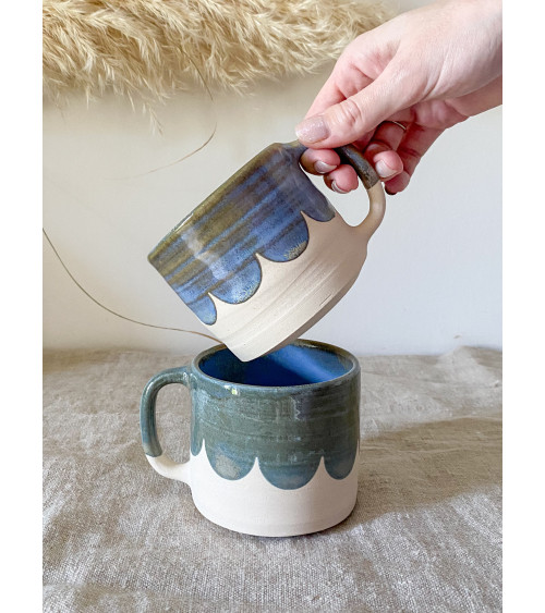 Handmade artisanal ceramic scalloped mug