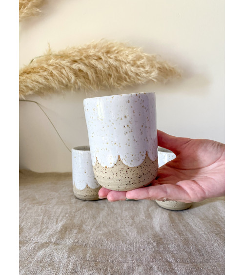 Handmade artisanal ceramic scalloped cup