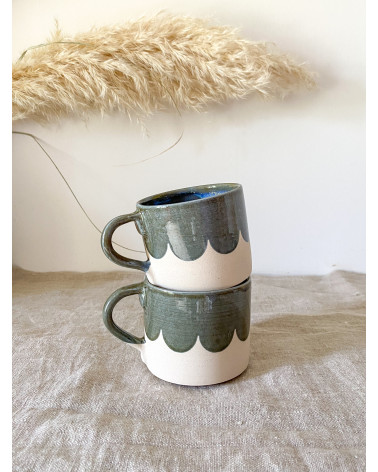 Handmade artisanal ceramic scalloped mug