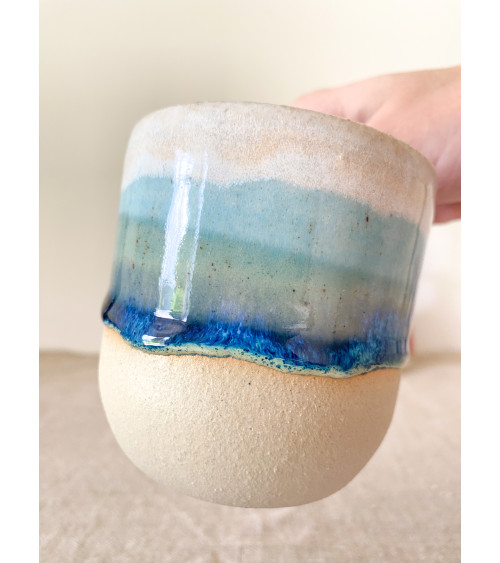 Handmade artisanal ceramic rainbow beach cup