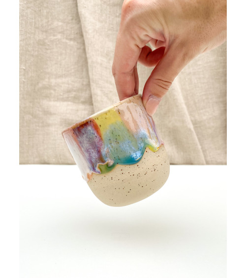 Handmade artisanal ceramic rainbow beach cup