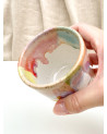 Handmade artisanal ceramic rainbow beach cup