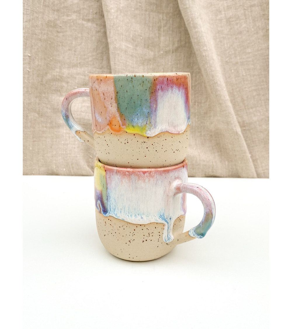 Handmade artisanal ceramic rainbow beach cup