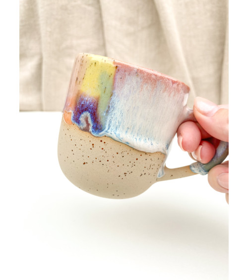 Handmade artisanal ceramic rainbow beach cup