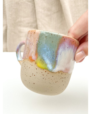 Handmade artisanal ceramic rainbow beach cup