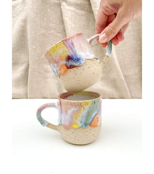 Handmade artisanal ceramic rainbow beach cup