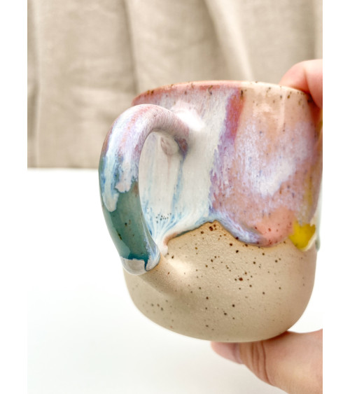 Handmade artisanal ceramic rainbow beach cup