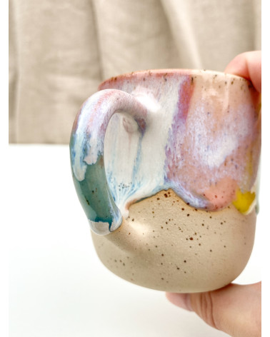 Handmade artisanal ceramic rainbow beach cup