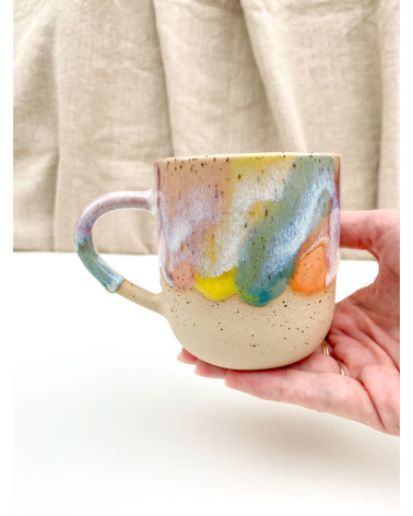 Handmade artisanal ceramic rainbow beach cup