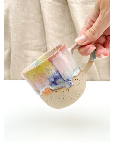 Handmade artisanal ceramic rainbow beach cup