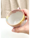 Handmade artisanal ceramic rainbow beach cup