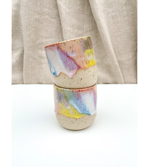 Handmade artisanal ceramic rainbow beach cup