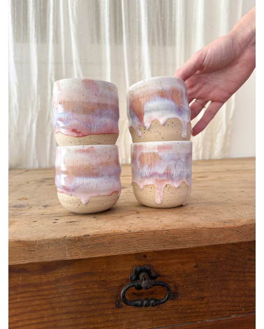 Handmade artisanal ceramic rainbow beach cup
