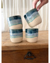 Handmade artisanal ceramic rainbow beach cup