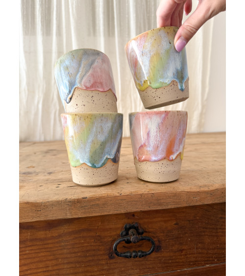 Handmade artisanal ceramic rainbow cup