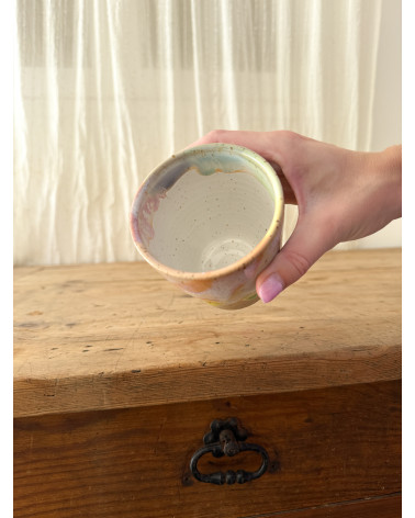 Handmade artisanal ceramic rainbow cup