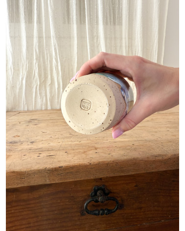 Handmade artisanal ceramic rainbow cup