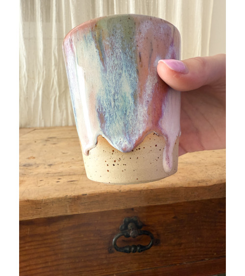 Handmade artisanal ceramic turquoise and pink cup