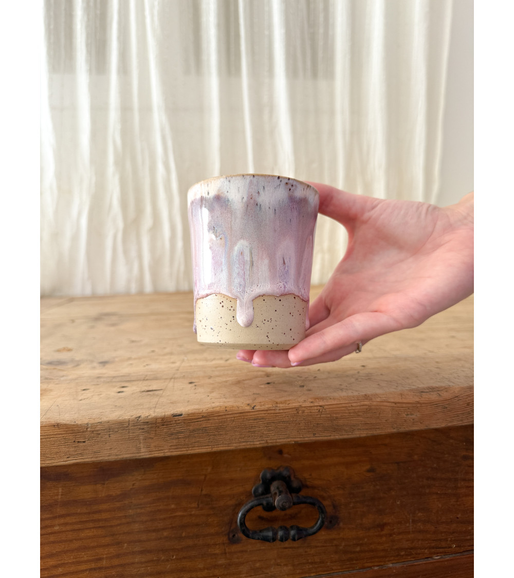 Handmade artisanal ceramic purple cup
