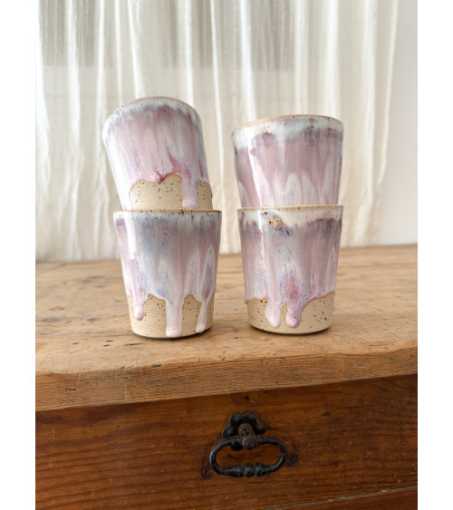 Handmade artisanal ceramic purple cup