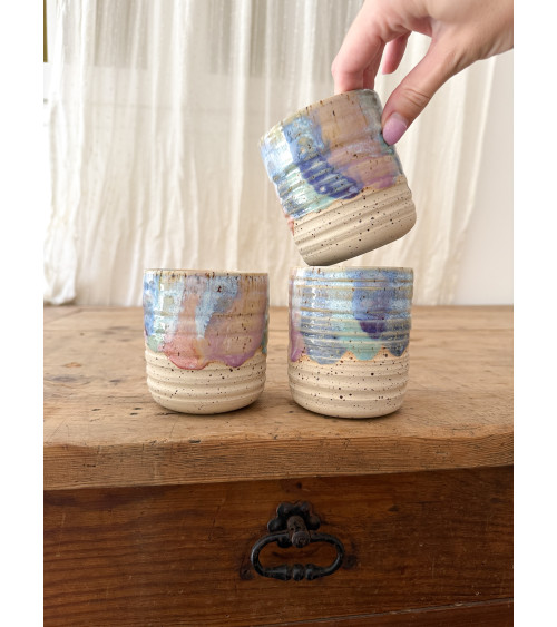 Handmade artisanal ceramic purple cup
