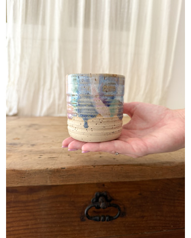 Handmade artisanal ceramic purple cup