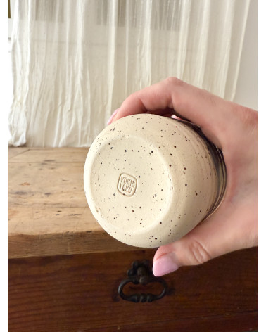 Handmade artisanal ceramic purple cup