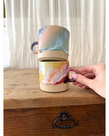 Handmade artisanal ceramic rainbow beach cup