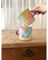 Handmade artisanal ceramic rainbow beach cup