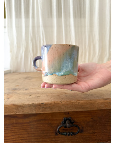 Handmade artisanal ceramic rainbow beach cup