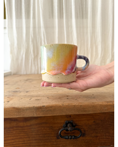 Handmade artisanal ceramic rainbow beach cup