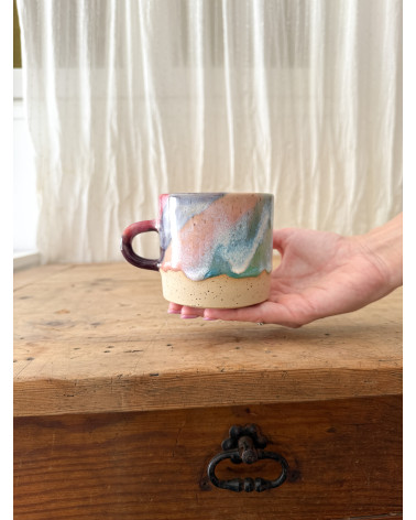 Handmade artisanal ceramic rainbow beach cup