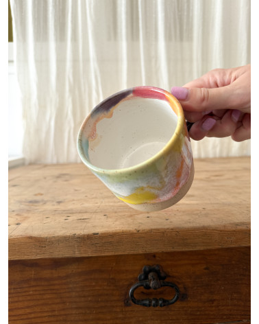 Handmade artisanal ceramic rainbow beach cup