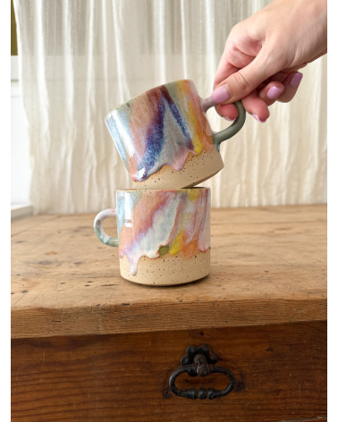 Handmade artisanal ceramic rainbow beach cup