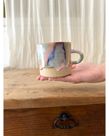 Handmade artisanal ceramic rainbow beach cup