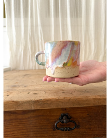 Handmade artisanal ceramic rainbow beach cup