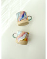 Handmade artisanal ceramic rainbow beach cup