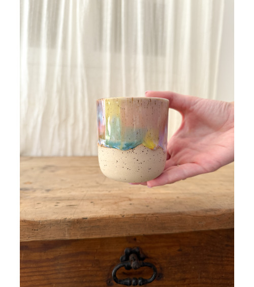 Handmade artisanal ceramic rainbow cup