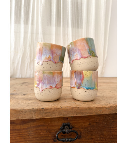 Handmade artisanal ceramic rainbow cup