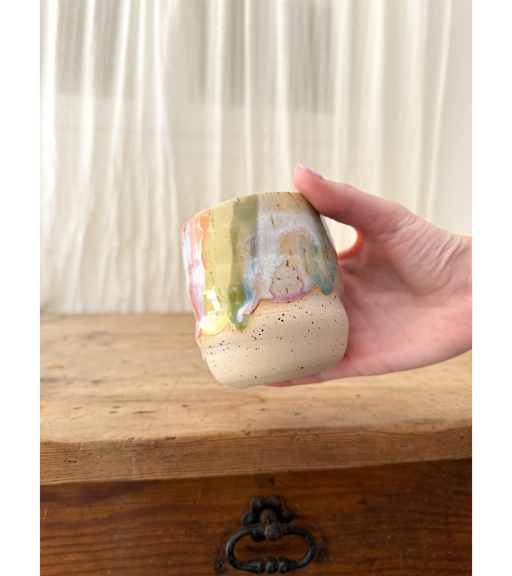 Handmade artisanal ceramic rainbow cup