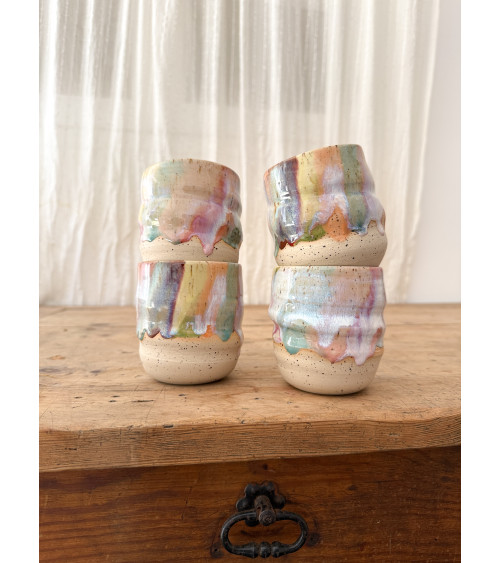 Handmade artisanal ceramic rainbow cup