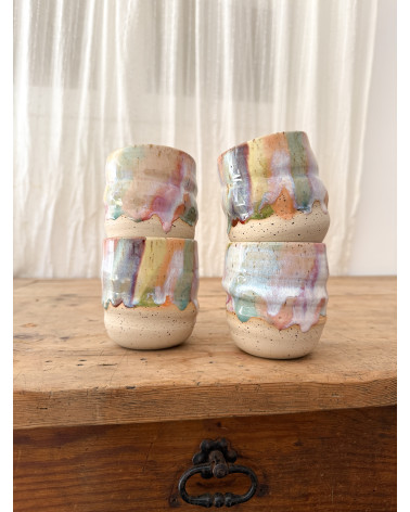 Handmade artisanal ceramic rainbow cup
