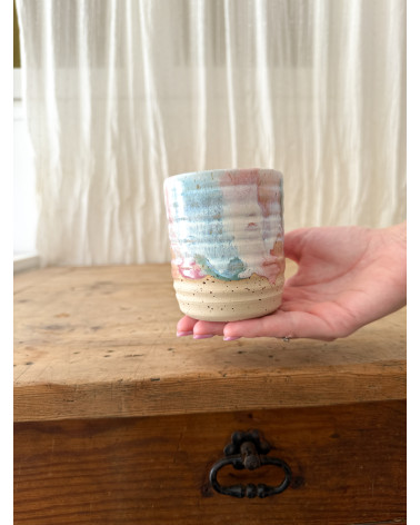 Handmade artisanal ceramic turquoise and pink cup