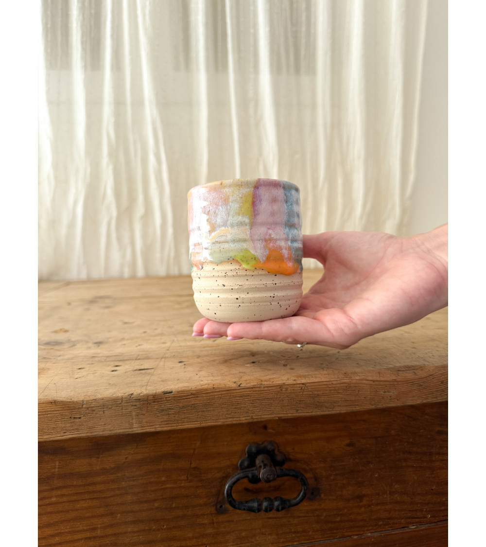Handmade artisanal ceramic rainbow cup